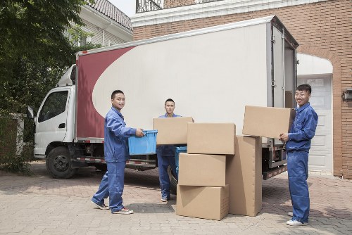 Commercial moving truck parked in Acton business district