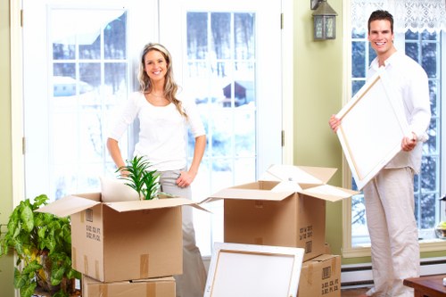 Technicians managing IT infrastructure during relocation